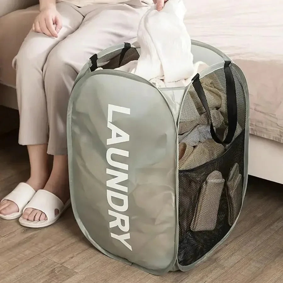 Cesto de roupa dobrável em malha